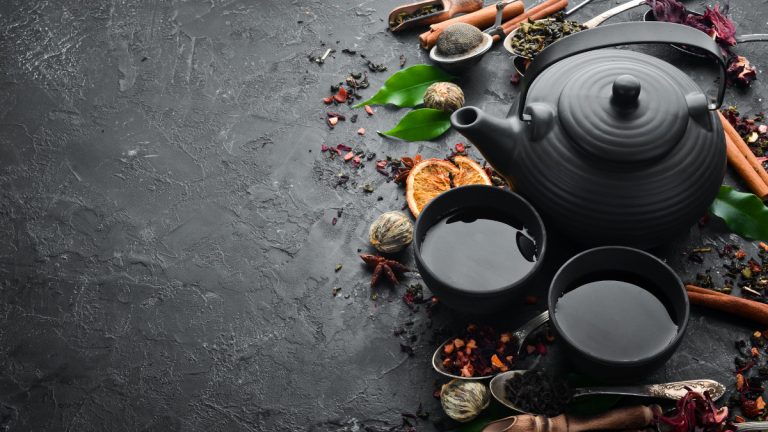 set of traditional chinese tea set on black background