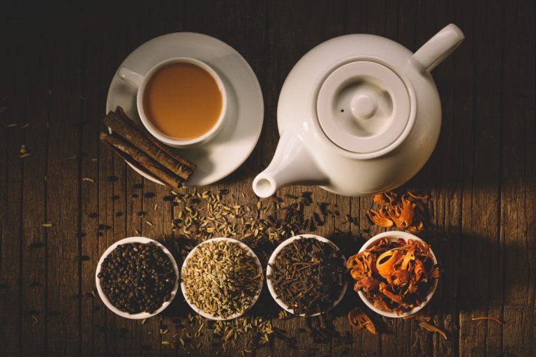 teapot and a cup of hot tea
