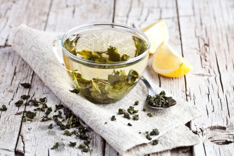 cup of green tea with lemon