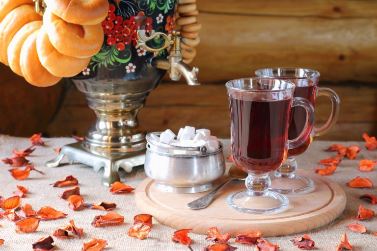 Russian tea from a samovar with sugar cubes