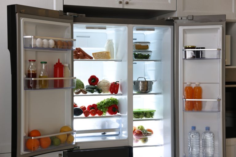 Open refrigerator full of different products