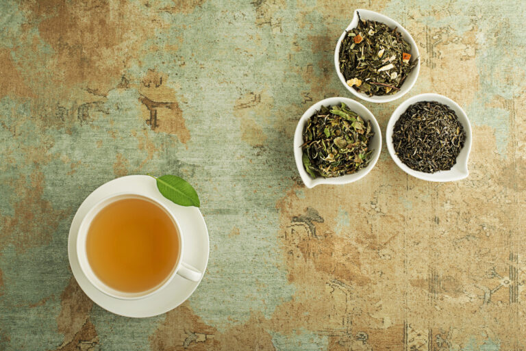 an infusion of tea leaves on a stone background
