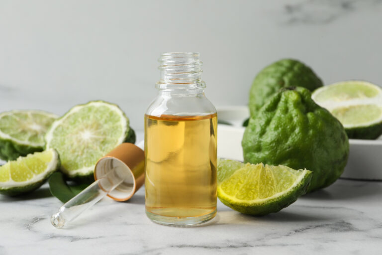 bergamot oil and fresh bergamot fruits