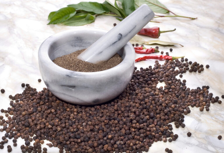 black pepper in a mortar and pestle