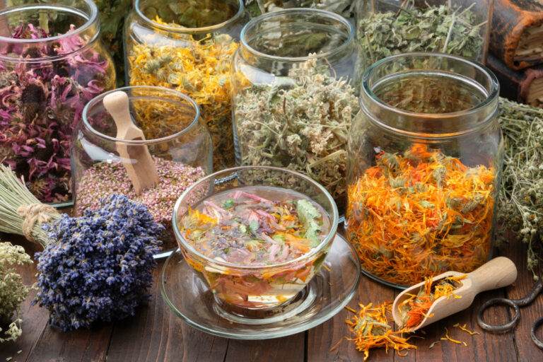 calendula tea and jars of dried herbs