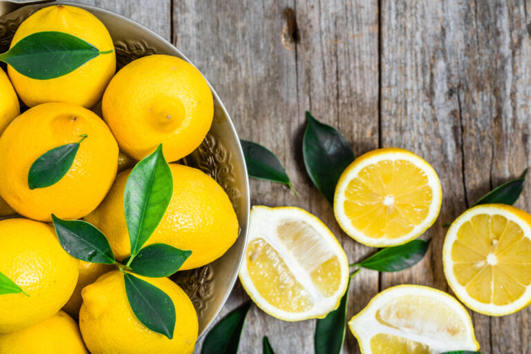 fresh lemons on market table